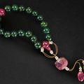 A rare pink and green tourmaline rosary bracelet, shou chuan, Qing dynasty, 18th-19th century