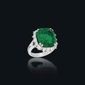 An Emerald and Diamond Cluster Ring 
