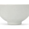 A large white-glazed anhua-decorated deep bowl, lianziwan, Yongle period (1403-1424)
