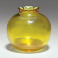 A rare yellow glass pomegranate-form water pot, Imperial Glassworks, Beijing, Qianlong mark and of the period (1736-1795)