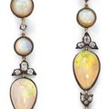 A pair of opal and diamond ear pendants. 