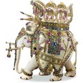 An Indian carved ivory elephant mounted in gold and jewels, retailed by Van Cleef & Arpels, New York, 20th century