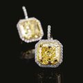 Pair of fancy intense yellow diamond earrings