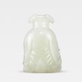 A rare white jade zodiac figure of a goat, Qianlong period (1736-1795)