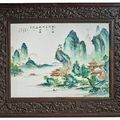 An exceptional and rare famille-rose 'landscape' panel, by Tang Ying, Qing dynasty, Qianlong period, dated Yihai year, 1755