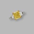 Platinum, 18 karat gold and fancy intense yellow diamond ring