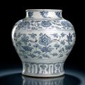 A blue and white porcelain jar 'guan' with flowers and Buddhist emblems, early Ming dynasty