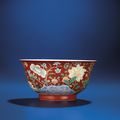 An Imperial coral-ground famille verte bowl, Yongzheng Yuzhi six-character mark within double-circles and of the period