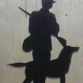 UN CHASSEUR AVEC SON CHIEN  (hauteur 17cm,largeur 12cm)