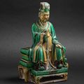 A large sancai-glazed figure of a Daoist Immortal, Ming Dynasty (1368-1644)