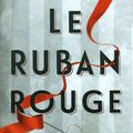 Lucy ADLINGTON : Le ruban rouge