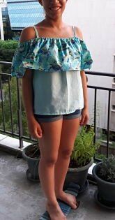 Top épaules nues et volant