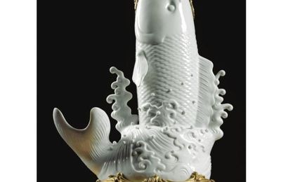 A large gilt-bronze-mounted white-glazed porcelain carp. 19th century