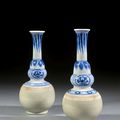 A pair of celadon, blue and white porcelain vases, Qing dynasty, 18th century