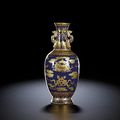 A fine gilt-decorated blue ground 'bajixiang' vase, seal mark and period of Qianlong (1736-1795)