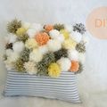 Pom pom pillow