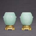 A pair of celadon-glazed drum-shaped vases, Seal marks and period of Qianlong, the stands French, by Henri Dasson, dated 1882