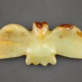 A yellow jade owl, probably Neolithic period, Hongshan culture (c. 3800-2700 BC)