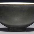 An unusual small 'silvered' bowl, Qianlong minyao mark in underglaze blue and of the period (1736-1795)