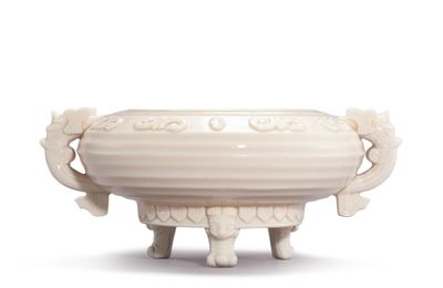 A blanc-de-Chine archaistic 'mask' incense burner, 17th century​​​​​​​