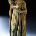 Polychrome stone sculpture of an Evangelist, Île-de-France, 14th century