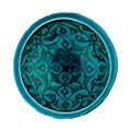  A Kashan turquoise-blue glazed pottery bowl, Central Iran, 12th century
