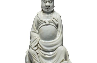 A 'Dehua' seated figure of Guandi, Qing dynasty