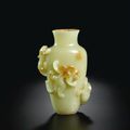 A carved Yellow Jade 'chilong' vase; Qing dynasty, 18th century