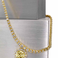 A fancy colored diamond and diamond pendant necklace