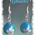 boucles d'oreilles yeux de chats fleuris