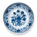A blue and white 'Lotus bouquet' saucer, Yongzheng mark and period (1723-1735)
