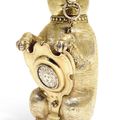 A German silver-gilt cup and cover in the form of a bear, maker's mark only MV conjoined, the shield Melchior Bair, Augsburg, ci