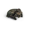 A small bronze figure of a recumbent ram, Ming dynasty