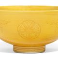 An incised yellow-glazed bowl, Qianlong six-character seal mark in underglaze blue and of the period (1736-1795)