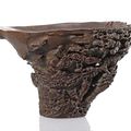A very rare and important rhinoceros horn cup shaped archaic Guan, China, 17th ct