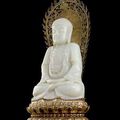 A rare large white jade figure of Buddha. 18th/19th century