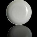 A very fine and rare anhua wintergreen or celadon glazed porcelain dish with shou character, mark and period of Yongzheng