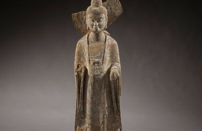 An important carved limestone figure of a Buddha, Northern Wei dynasty, 6th century