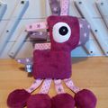 Doudou cheval fuchsia rose gris