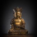 A gilt-bronze figure of the Buddha Paree, late Ming dynasty