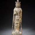 A large carved wood figure of Guanyin. Ming Dynasty