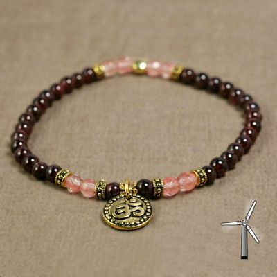 Little Doña - bracelet perles grenat - breloque OM tibétain