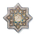 A Kashan lustre pottery star tile, Persia, 13th-14th Century
