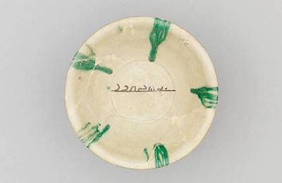 An Abbasid calligraphic pottery Bowl. Mesopotamia, 9th Century