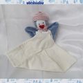 Doudou Peluche Pingouin Bleu Bonnet Rayures Rouges Mouchoir Blanc Sucre d'Orge