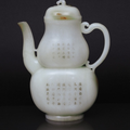 A fine and rare white jade 'double-gourd' ewer with poem inscription. China, Qing-dynasty (1644-1911)