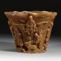 A large and rare carved rhinoceros horn cup. Ming dynasty, 16th / 17th century