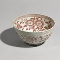 A rare copper-red 'floral' bowl, Ming dynasty, Hongwu period