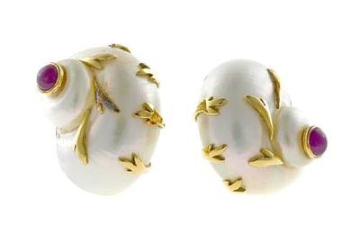 A pair of shell and ruby earclips, Maz