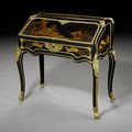 A rare French mid-19th century ebony and ebonised Japanese lacquer bureau à dos d'âne, possibly by Louis Auguste Alfred Beurdele